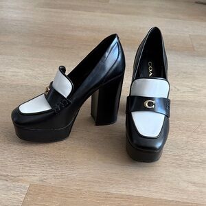 Coach Black & White Platform Loafers with Gold Accent